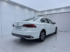 Volkswagen Bora 200TSI DSG Comfort Pro - ფოტო 4