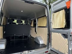 New Journey Xintu V80 2.0T AMT Classic Aoyun Tong Short Wheelbase Mid-roof 5/6 Seater - ფოტო 11
