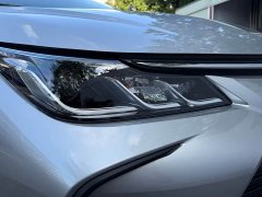 Toyota Corolla 2021 Hybrid 1.8L E-CVT Elite - ფოტო 10