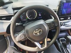Toyota Corolla Hybrid 1.8H E-CVT Luxury - ფოტო 10