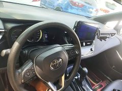 Toyota Corolla Hybrid 1.8H E-CVT Luxury - ფოტო 9