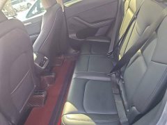 Tesla Model Y Rear-Wheel Drive - ფოტო 16