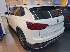 Volkswagen Taos 330TSI FWD Luxury Smart Connect Edition - ფოტო 4