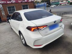 Toyota Corolla 2021 Hybrid 1.8L E-CVT Elite - ფოტო 4