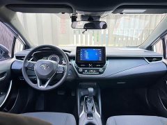 Toyota Corolla Hybrid 1.8H E-CVT Luxury - ფოტო 9