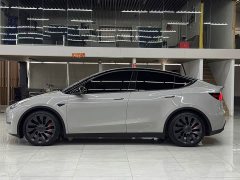 Tesla Model Y Performance All-Wheel Drive - ფოტო 4