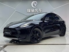 Tesla Model Y Rear-Wheel Drive - ფოტო 1