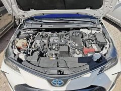 Toyota Corolla 2021 Hybrid 1.8L E-CVT Elite - ფოტო 10
