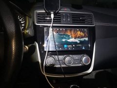 Nissan Qida Tiida 1.6L CVT Smart Edition - ფოტო 14