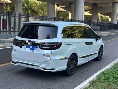Honda Odyssey 2.0L e:HEV Luxury - ფოტო 4