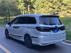 Honda Odyssey 2.0L e:HEV Luxury - ფოტო 6