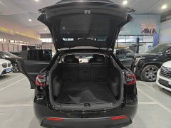 Tesla Model Y Standard Range RWD - ფოტო 18