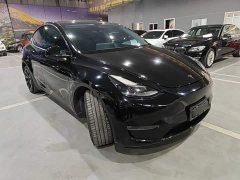 Tesla Model Y Standard Range RWD - ფოტო 3
