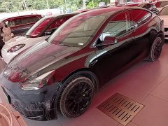 Tesla Model Y Standard Range RWD - фото 1