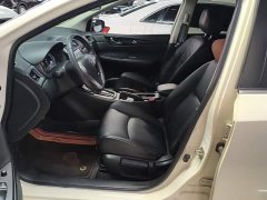 Nissan Qida Tiida 1.6L CVT Smart Edition - ფოტო 14