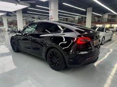 Tesla Model Y Rear-Wheel Drive - ფოტო 12