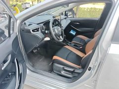 Toyota Corolla Hybrid 1.8L E-CVT Elite - ფოტო 4