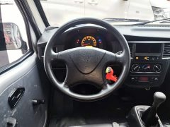 Wuling Zhiguang 1.5L Practical 5/7-seater - ფოტო 10