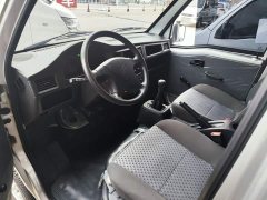 Wuling Zhiguang 1.5L Practical 5/7-seater - ფოტო 15