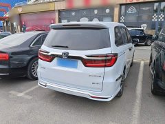 Honda Odyssey 2.0L e:HEV Luxury - ფოტო 6