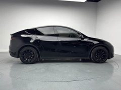 Tesla Model Y Long Range All-Wheel Drive - ფოტო 4