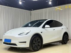 Tesla Model Y Rear-Wheel Drive - ფოტო 1