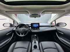 Toyota Corolla Hybrid 1.8L E-CVT Elite - ფოტო 11
