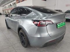 Tesla Model Y Standard Range RWD - ფოტო 4