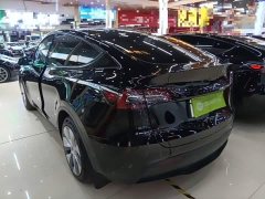 Tesla Model Y Standard Range RWD - ფოტო 4