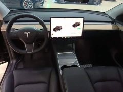 Tesla Model Y Standard Range RWD - ფოტო 9