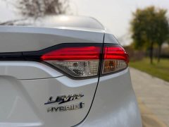 Toyota Corolla Hybrid 1.8H E-CVT Sport - ფოტო 20