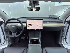 Tesla Model Y Standard Range RWD - ფოტო 17