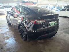 Tesla Model Y Standard Range RWD - ფოტო 12