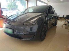 Tesla Model Y Rear-Wheel Drive - ფოტო 1