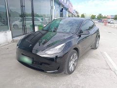 Tesla Model Y Rear-Wheel Drive - ფოტო 1