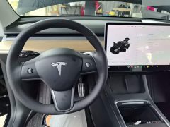 Tesla Model Y Standard Range RWD - ფოტო 9