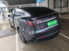 Tesla Model Y Rear-Wheel Drive - ფოტო 4