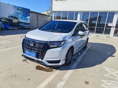 Honda Odyssey 2.0L e:HEV Luxury - ფოტო 1