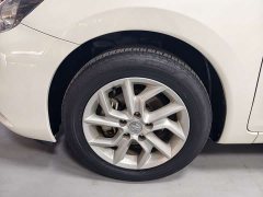Nissan Qida Tiida 1.6L CVT Smart Edition - ფოტო 11