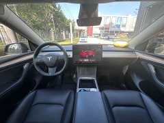 Tesla Model Y Rear-Wheel Drive - ფოტო 4