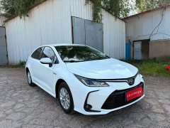 Toyota Corolla Hybrid 1.8L E-CVT Pioneer Edition - фото 1