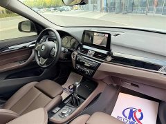 BMW X1 xDrive30Le Deluxe Version - ფოტო 11