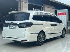 Honda Odyssey 2.0L e:HEV Luxury - ფოტო 9