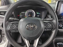 Toyota Corolla Hybrid 1.8H E-CVT Luxury - ფოტო 11