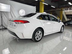 Toyota Corolla Hybrid 1.8H E-CVT Luxury - ფოტო 6