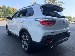 Kia Sportage 2.0L Automatic Smart Luxury Edition - ფოტო 14