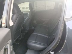 Tesla Model Y Rear-Wheel Drive - ფოტო 4