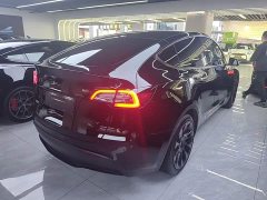 Tesla Model Y Rear-Wheel Drive - ფოტო 4