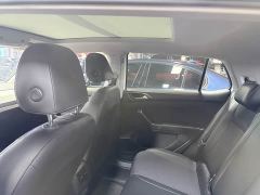 Volkswagen Touran 200TSI DSG Smart Connected Edition - ფოტო 12