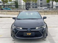 Toyota Corolla Hybrid 1.8H E-CVT Luxury - ფოტო 1